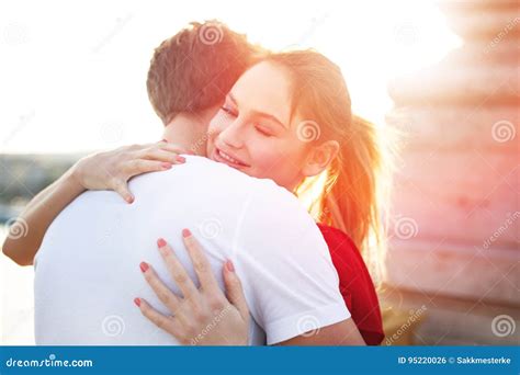 Young Blonde Woman Embracing Boyfriend Outdoor Stock Photo Image Of