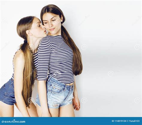 Two Cute Teenagers Having Fun Together Isolated On White Stock Photo Image Of Looking Pretty