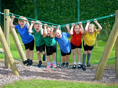 Kids Queue To Enjoy Revamped Playground At School Near