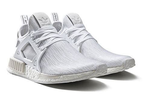 Crafted with city exploration as a focal point, the fusion of boost and primeknit spawned a perfect sneaker for styling, providing a mercurial silhouette perfect for all interpretations. adidas NMD Triple White XR1 Release Date | SneakerNews.com