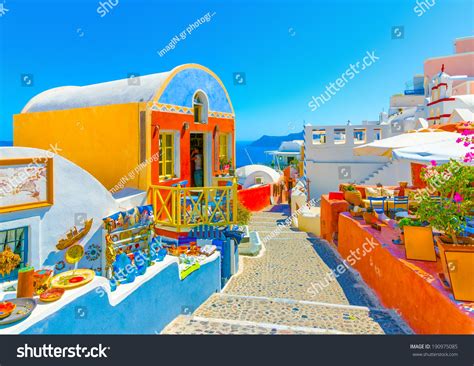 Typical Colorful Narrow Street In Oia The Most Beautiful Village Of