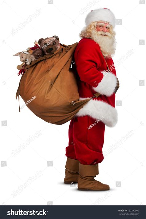 Real Santa Claus Carrying Big Bag Full Of Ts Isolated On White