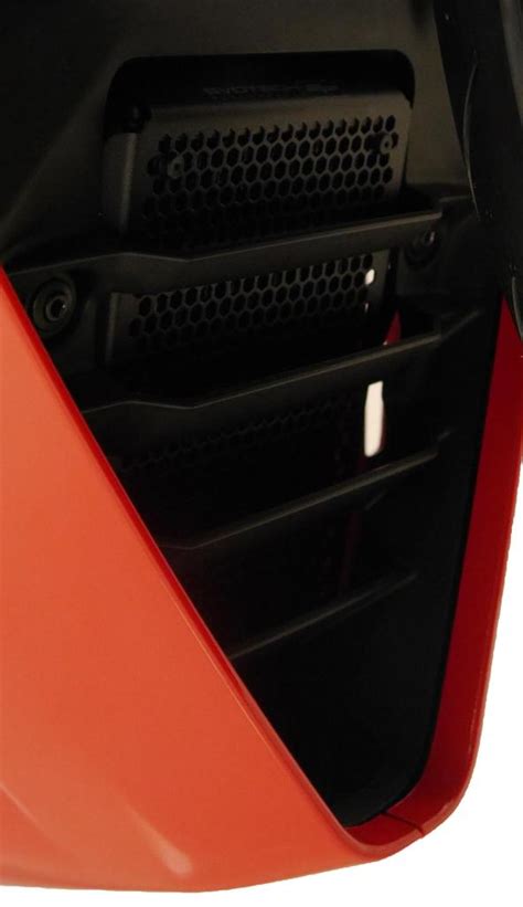 The cooler features a unique turbulator system that evenly distributes oil across the cooling chambers. Oil Cooler Guard by Evotech Performance (PRN013733)