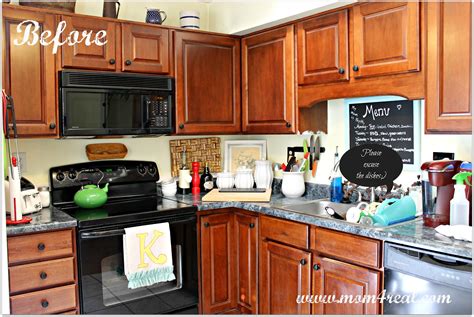 Although the process below is for my garage cabinets, you can follow the same technique to paint veneer kitchen cabinets as well! White Kitchen Reveal ~ A Before & After - Mom 4 Real