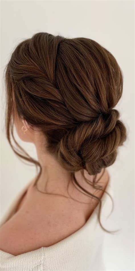 43 Stunning Updo Hairstyles 2022 Brunette Twisted Low Bun