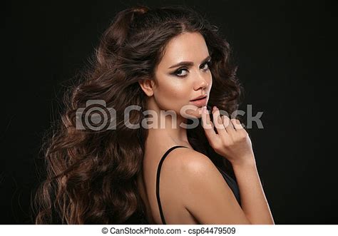 Beautiful Woman With Long Brown Curly Hair Closeup Portrait With A