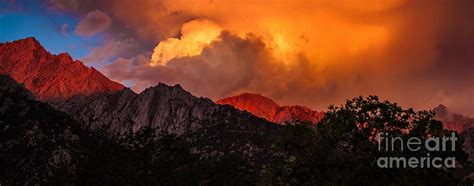 Mountain Top Sunrise With Orange Dramatic Storm Clouds
