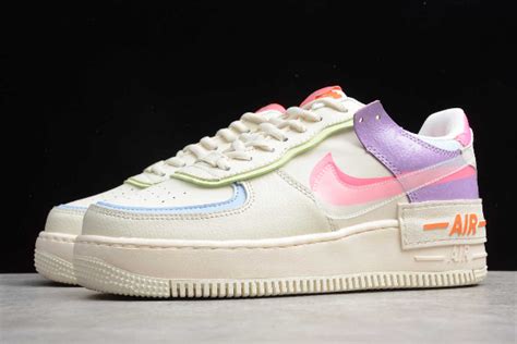 Wmns air force 1 pixel silhouette leather upper perforated toe box padded collar af1 logo patch on tongue and rear swoosh on side panels tonal stitching flat cotton laces nike air sole unit rubber outsole style: 2019 Wmns Nike Air Force 1 Shadow Beige White/Orange ...