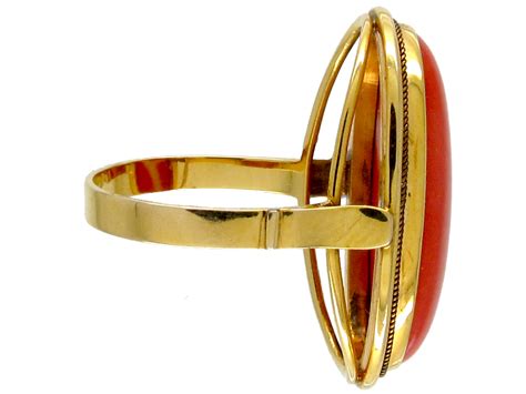 A ladies ring comprised of a 14k yellow gold upper portion, with 18k yellow gold shoulders and shank. 18ct Gold Coral Ring - The Antique Jewellery Agency