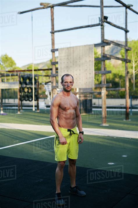 Shirtless Fit Young Man Posing At Outdoors Gym Military Camp Stock