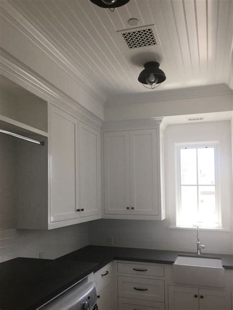 Installing a beadboard ceiling can provide you with a nice option for the ceiling in any room. Beadboard Galley Kitchen Ceiling | Ceiling fan in kitchen ...