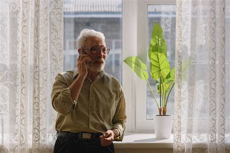 Old Man At Home By Stocksy Contributor Milles Studio Stocksy