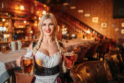Sexy Waitress Holds Two Mugs Of Fresh Beer In Pub Stock Photo 1467509