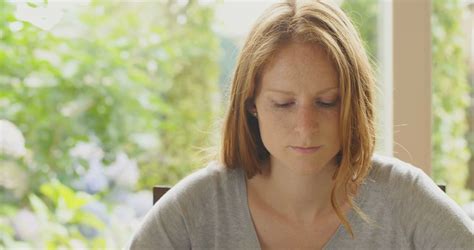 Young Redhead Woman Praying At Home Slow Stock Footage Sbv 308666303