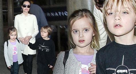 Angelina Jolie Walks Through Lax With Adorable Twins Knox And Vivienne—see The Pics