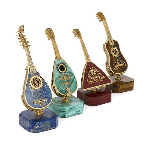 Set Of Semi Precious Stone And Silver Gilt Miniature Instruments