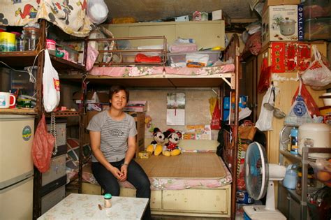 Photographs Of Residents In Their Tiny Flats In Hong Kongs Oldest