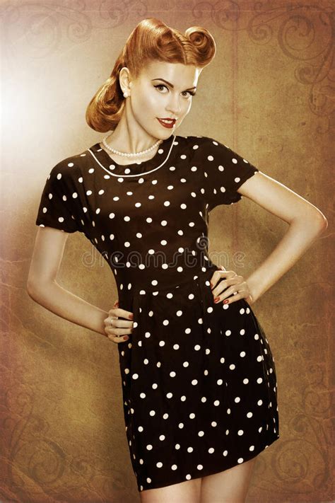 Pin Up Retro Girl In Classic Fashion Polka Dots Dress Posing Stock