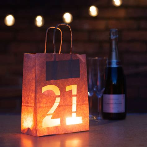 Then fill your space with 21st birthday theme decorations like table confetti, a table decorating kit, bright balloon bouquets and personalized party favors. 21st Birthday, Bold Lantern Bag Party Decoration By ...