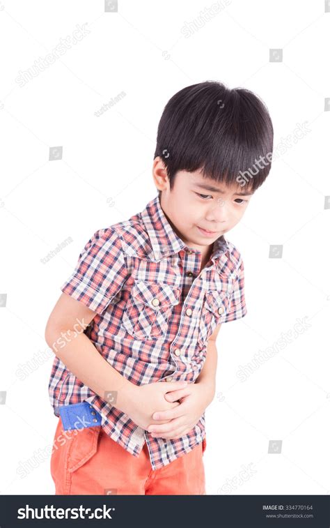 Unhappy Little Boy Showing Stomach Pain Stock Photo 334770164