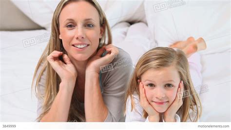 Blonde Mother And Daughter Posing Stock Video Footage