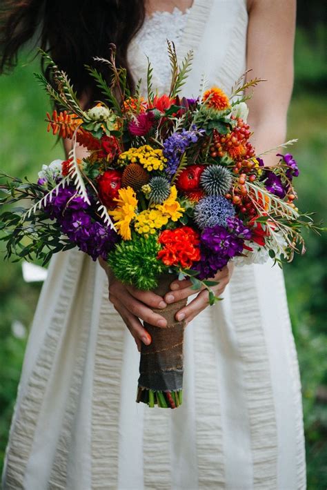 this where the wild things are wedding is seriously magical bright wedding flowers colorful