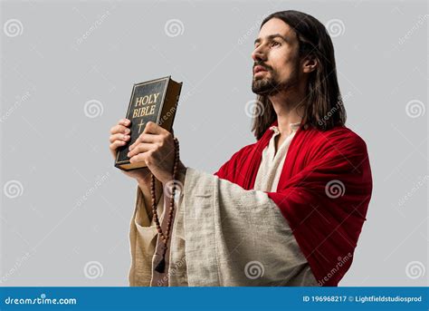 Jesus Holding Holy Bible Isolated On Grey Stock Image Image Of