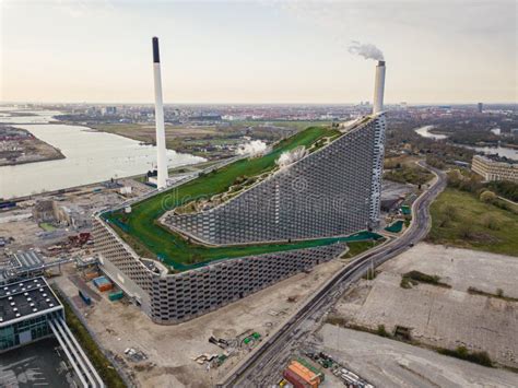 View Of Amager Bakke Factory With Skiing Slope On The Rooftop In