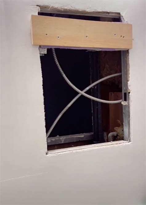 Woman Discovers A Hole Behind Her Bathroom Mirror Decides To Go In And Finds An Entire
