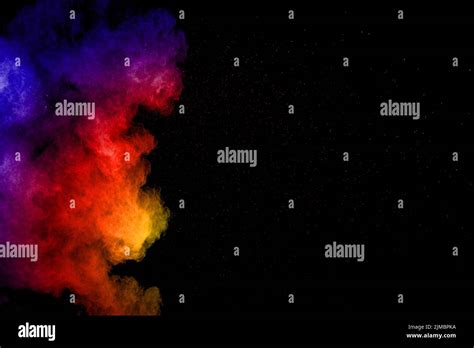 Abstract Color Powder Explosion On Black Backgroundfreeze Motion Of
