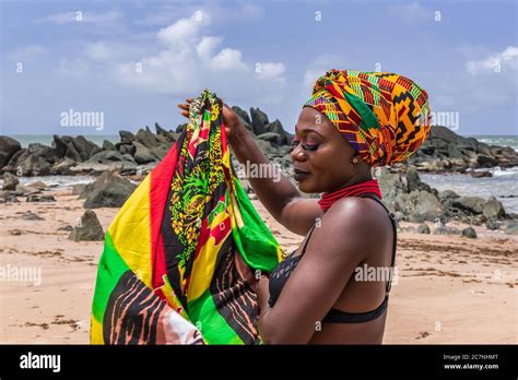 Ghana Woman On The Beautiful Beach Of Axim Located In Ghana West Africa Headdress In