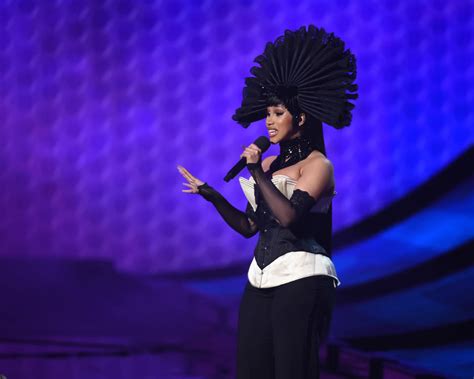 all of cardi b s bold outfits from the 2021 american music awards