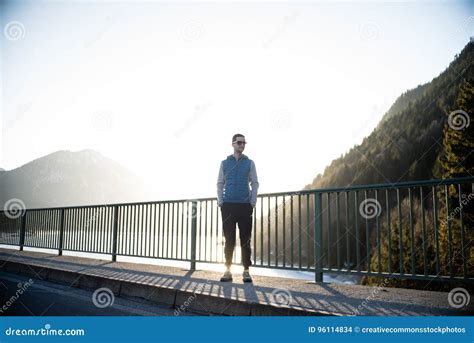 Man Standing On Bridge Picture Image 96114834