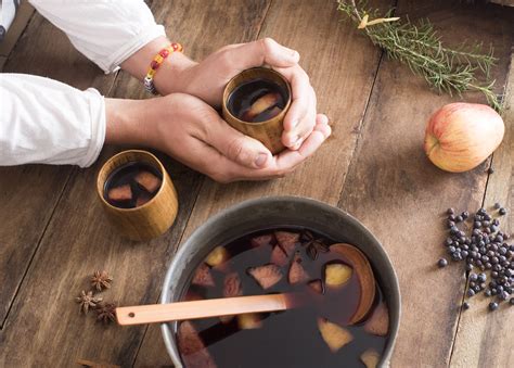 Person Making Mulled Wine With Fruit And Spices Free Stock Image