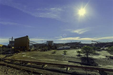 Riotinto Mines Surrounded By Cranes And Chain Link Fences Under The