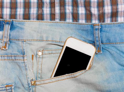 Mobile Phone In Jeans Pocket — Stock Photo © Massonforstock 28859559