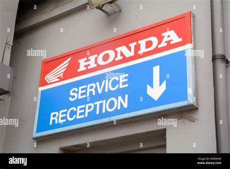 Honda Sign For Service Reception At Motorcycle Garage Stock Photo Alamy