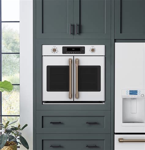 White shaker kitchen cabinets with quartz countertops. CTS90FP4MW2 Overview - Café™ 30" Smart French-Door Single ...