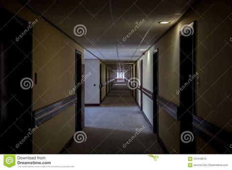 Dark Hotel Lobby With Rooms On Both Sides Of The Corridor Taken In A 70