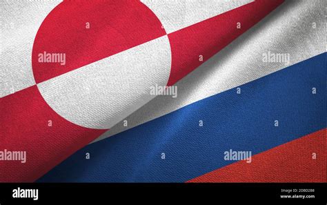 Greenland And Russia Two Flags Textile Cloth Fabric Texture Stock