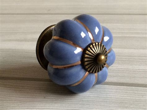 Offers hundreds of types of decorative kitchen cabinet hardware available in many different finishes. Blue Pumpkin Knobs Kitchen Cabinet Knobs Dresser Knob ...