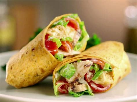 But it is convenient, inexpensive, and tasty, so if you fall into the almost 50% of americans who eat at there are one or two items on sonic's menu that have fewer calories than the grilled chicken wrap, but they also feature less fiber, less protein, and an. Grilled Chicken Caesar Wrap Recipe | Jeff Mauro | Food Network