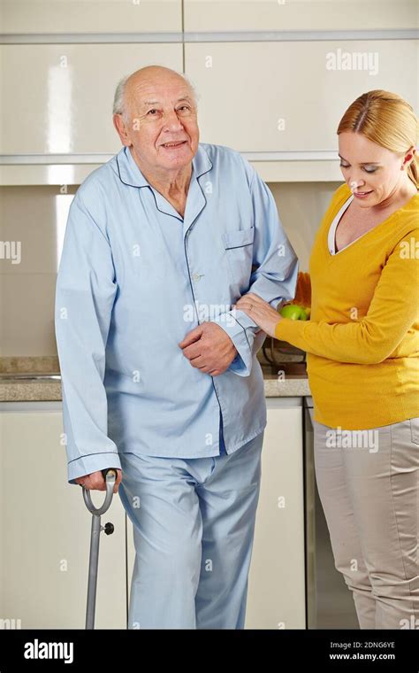 Nurse Helping Senior Patient Stock Photo Alamy