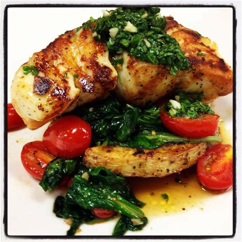 Grilled Grouper With Roasted Yukon Potatoes Spinach And Grape Tomatoes
