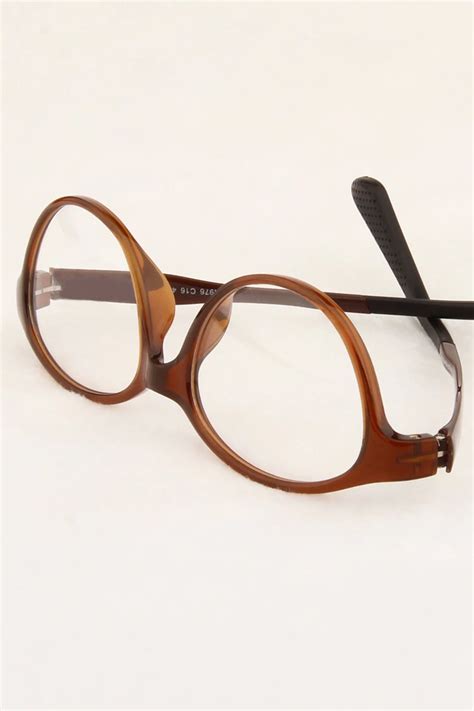 tr976 oval brown eyeglasses frames leoptique