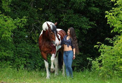 Beautiful Cowgirl Bareback Ride Her Horse In Woods Glade Stock Image