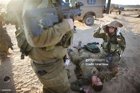 a female paramedic soldier from the karakal battalion treats a male news photo getty images