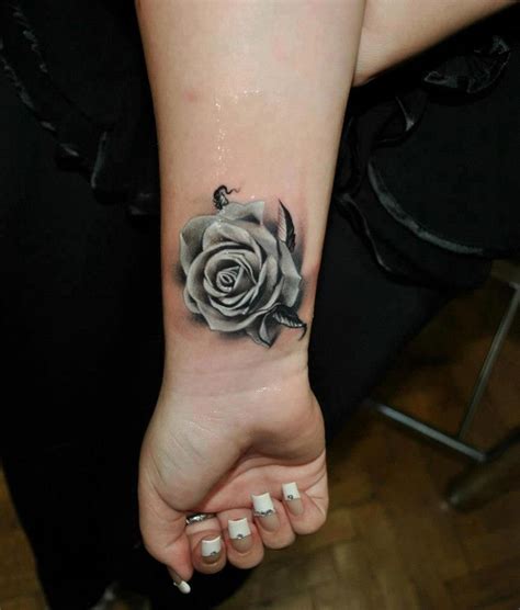 Black geometric abstract tattoo on the forearm. black n white | Rose tattoos | Pinterest