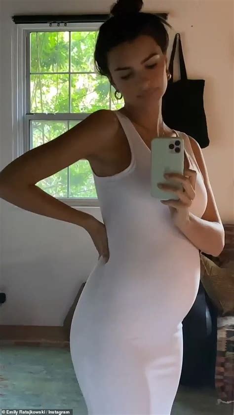 Emily Ratajkowski Caresses Baby Bump As She Shows It Off In Clinging