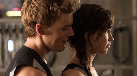 See Katniss Finnick And Peeta In New Catching Fire Pics